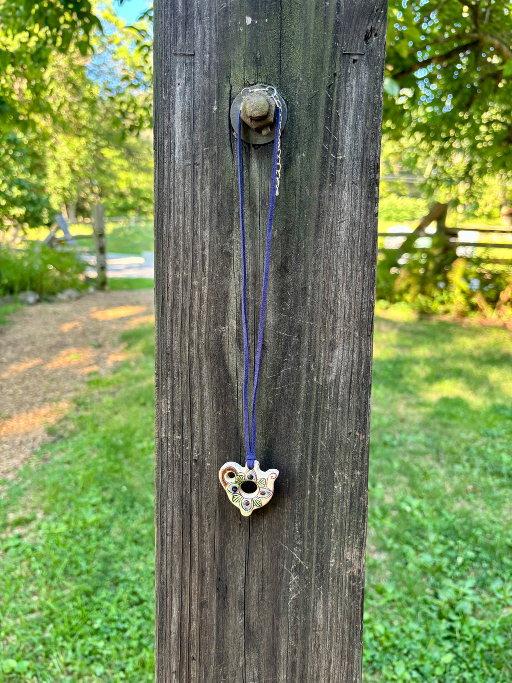 Openwork Ceramic Bird Necklace, Blue Cord